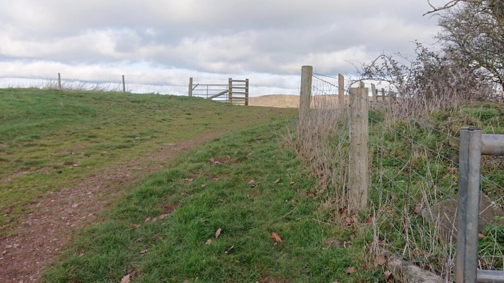 Head through this gate into the field the Adzor Bank trig point is in