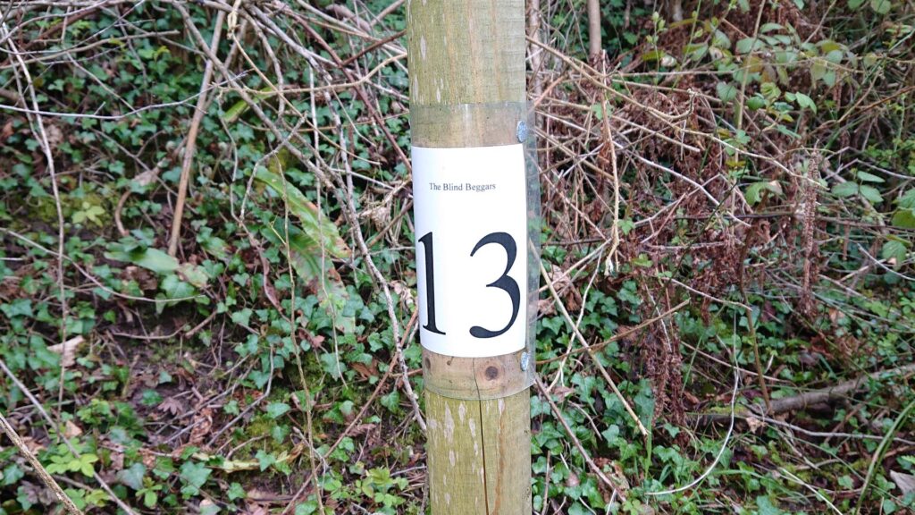 A curious sign on the way to the trig point