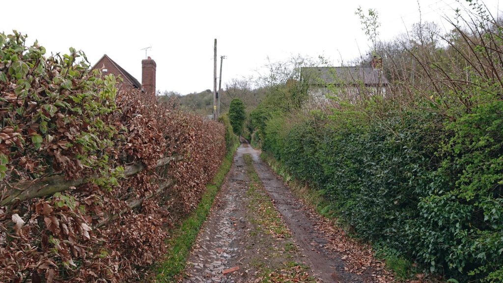 Narrow lane at the start of the Birley Hill trig point bag